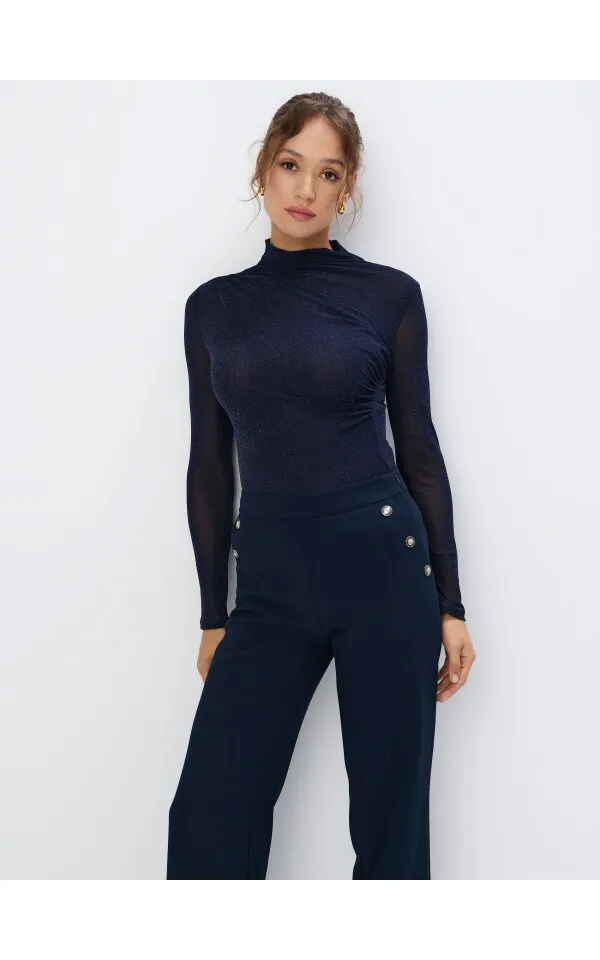 Blusa con filo metallizzato