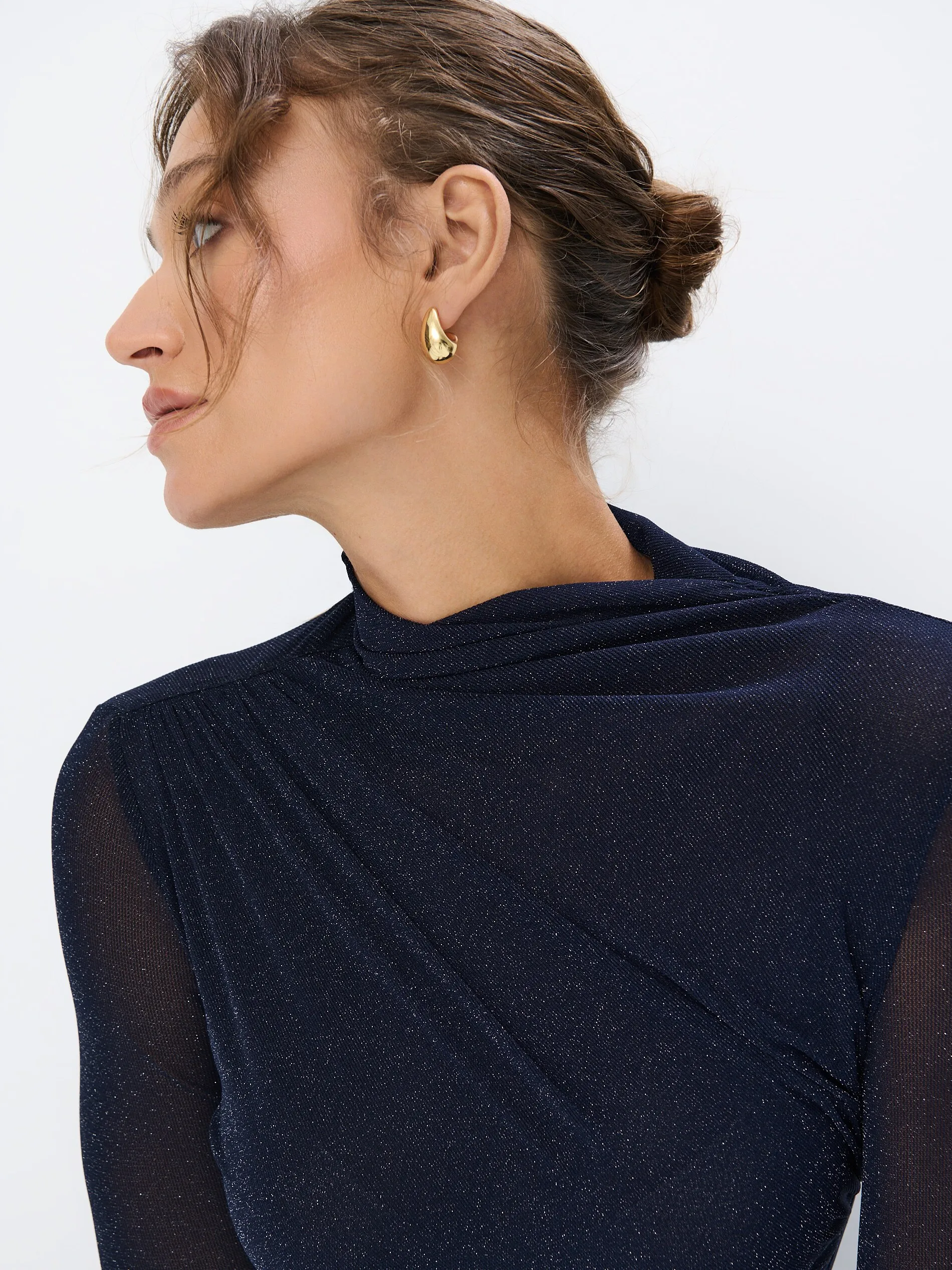 Blusa con filo metallizzato