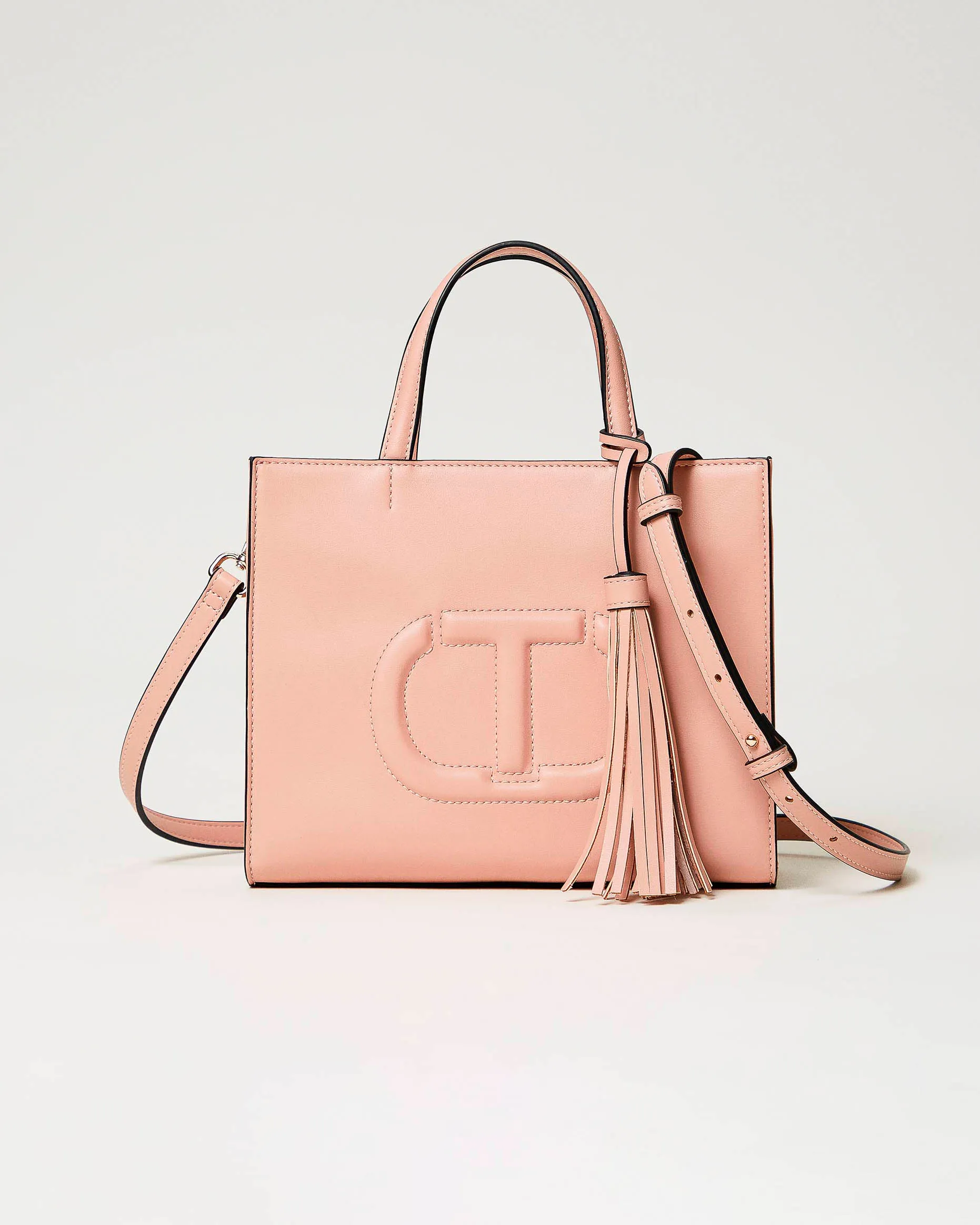 Borsa a mano rosa cipria in similpelle liscia con Oval T a rilievo e doppio manico