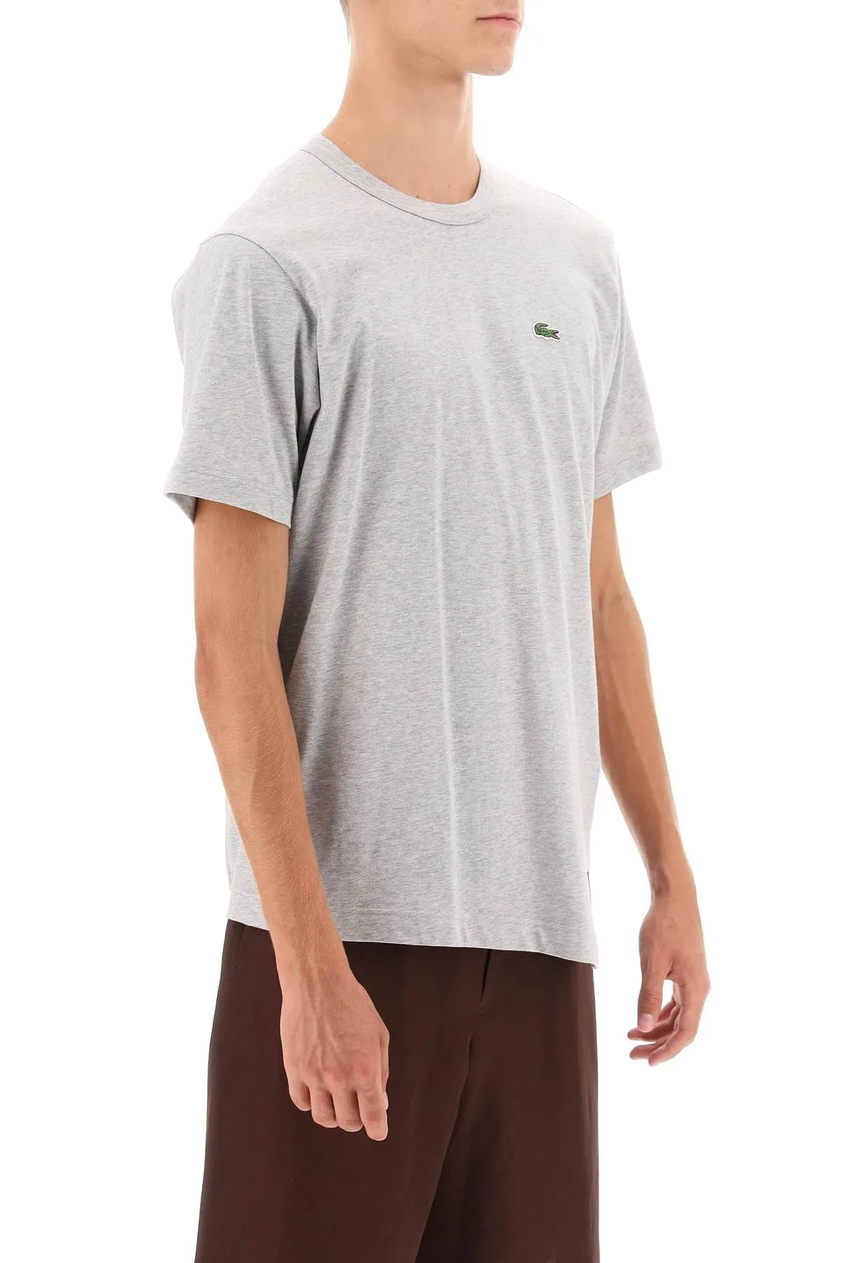 Camicia di comme des garcons x maglietta asimmetrica di lacoste