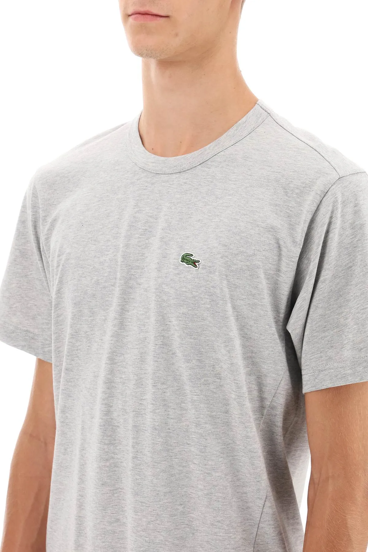 Camicia di comme des garcons x maglietta asimmetrica di lacoste