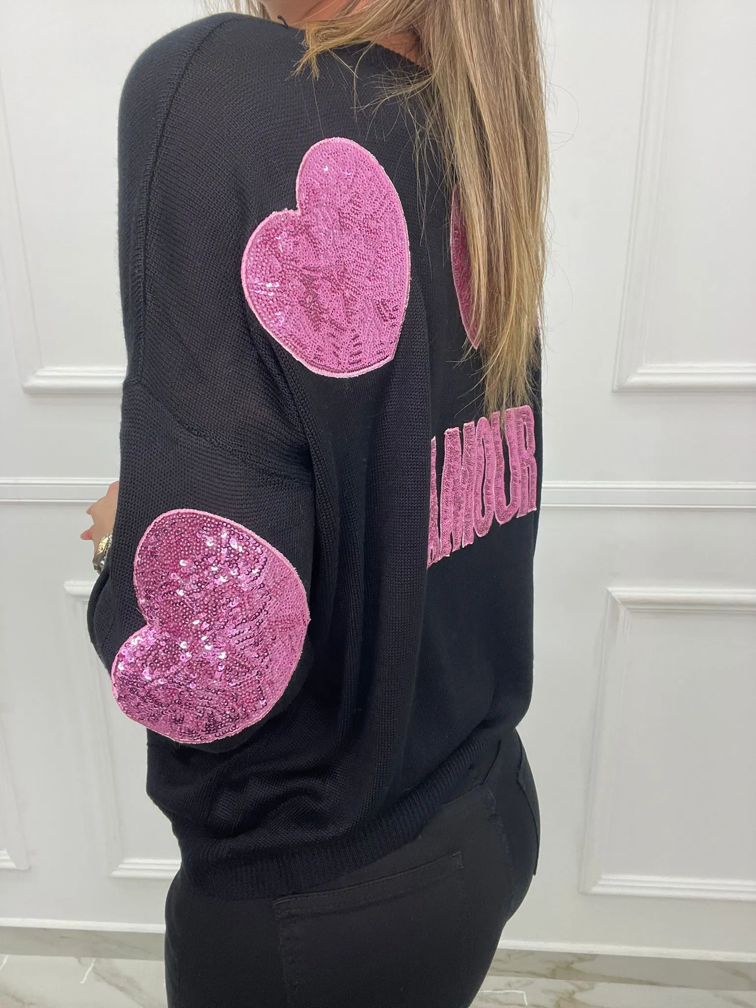 Maglioncino in filo con cuori in paillettes dietro