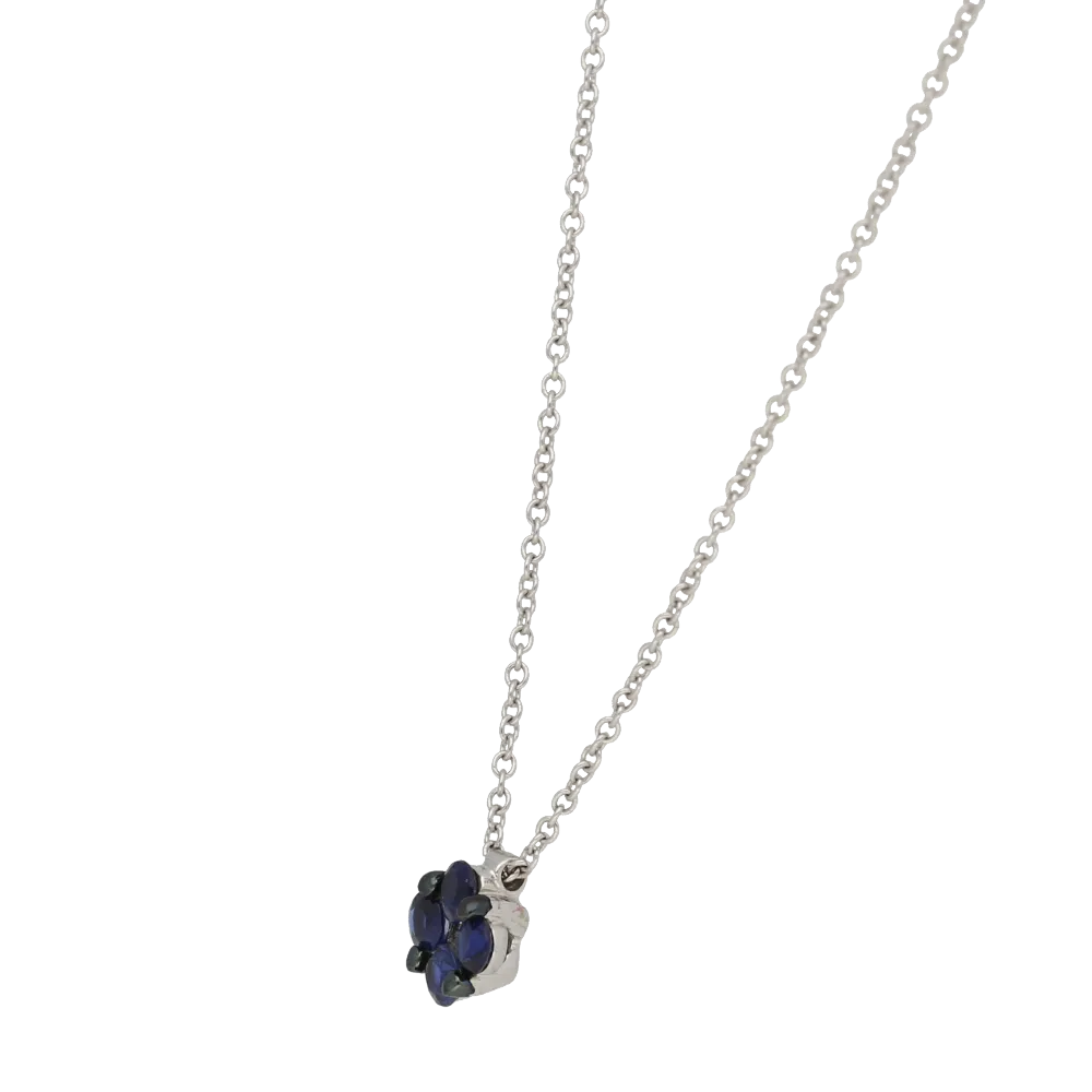 Pendente a forma di fiore con zaffiri blu ct. 0,38 e diamante ct.0,02