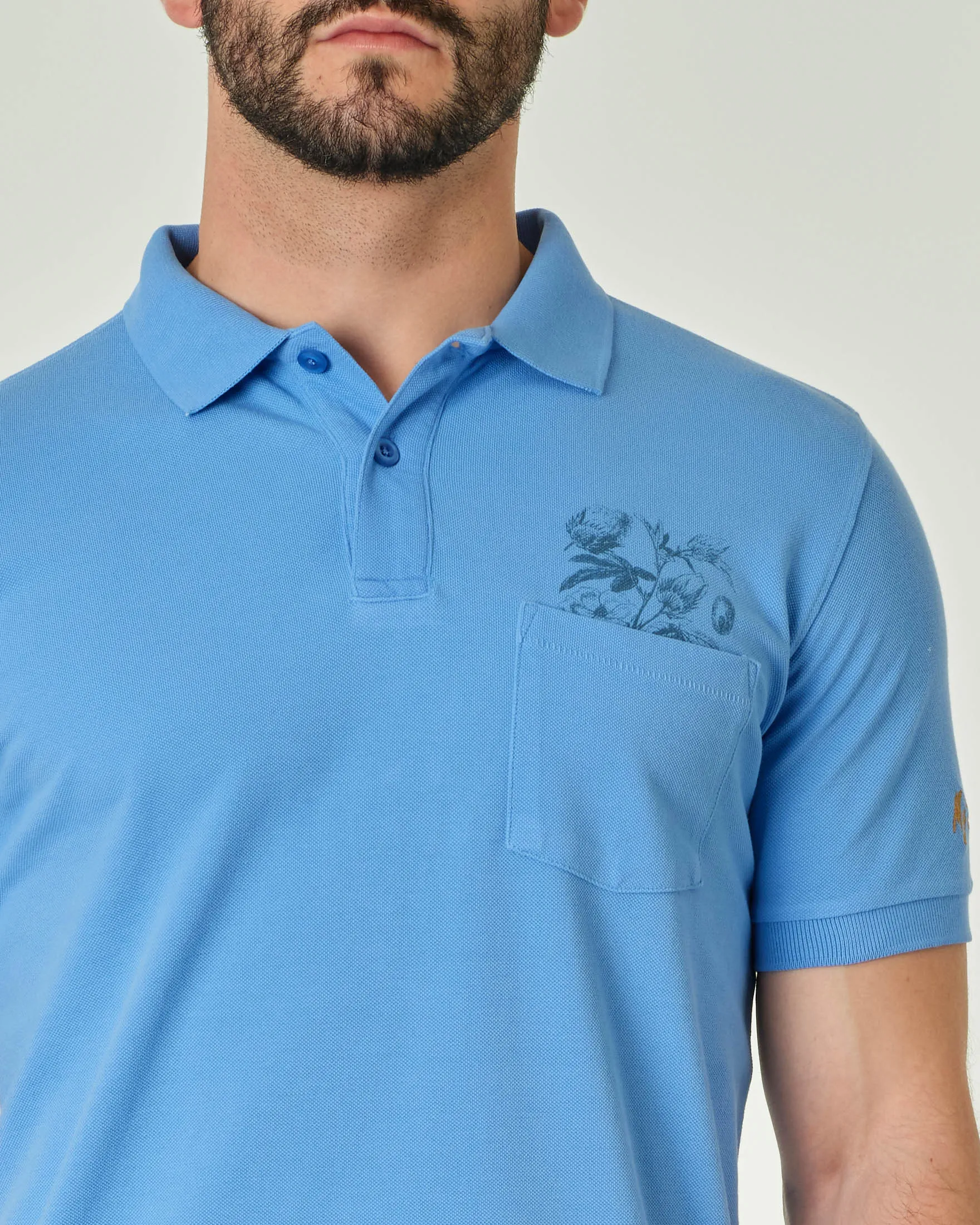 Polo celeste mezza manica con taschino in pima cotton