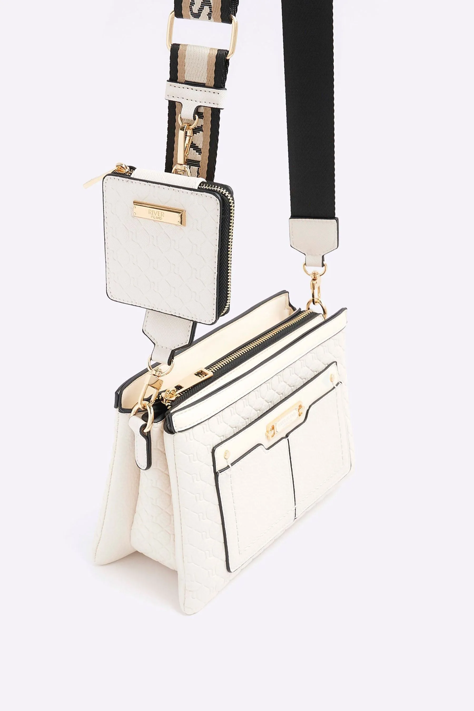 River Island - Borsa a tracolla con monogramma    