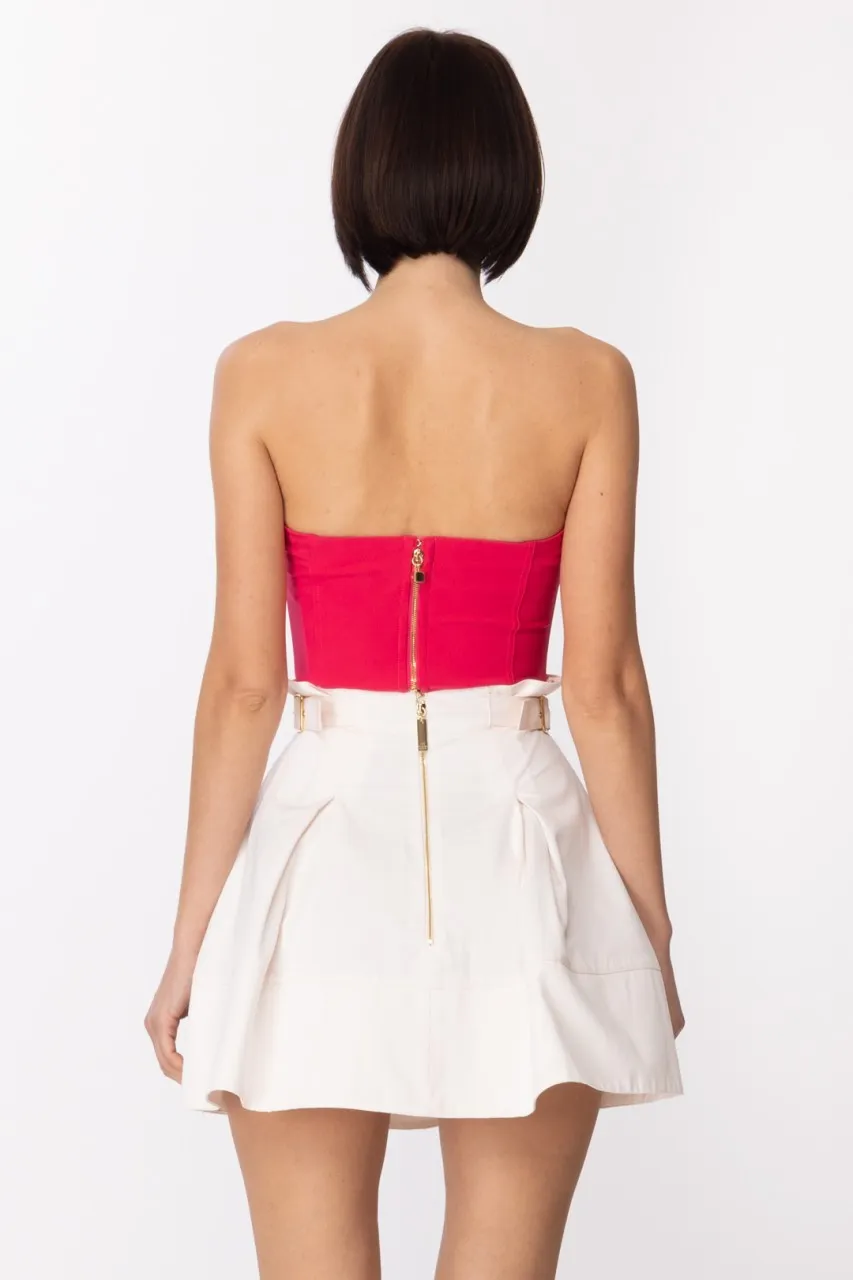 Top con ciondolo moneta Fuxia